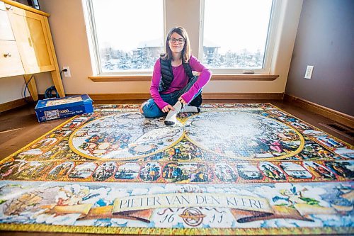 MIKAELA MACKENZIE / WINNIPEG FREE PRESS

Alexa Storozuk, 13, poses for a portrait with her completed 9,000 piece puzzle in her home in West St. Paul on Thursday, Dec. 30, 2021. For Bryce Hunt story.
Winnipeg Free Press 2021.