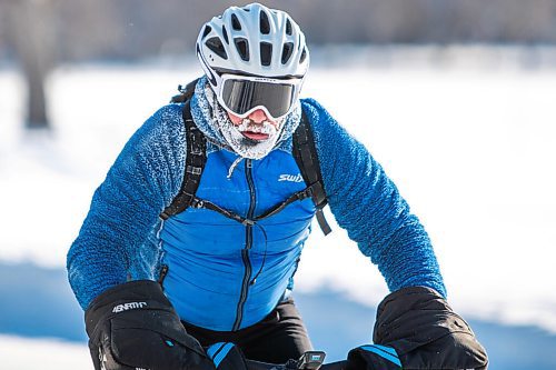 Daniel Crump / Winnipeg Free Press. Dillan Pearse rides a fat tire bike in Assiniboine Park in Winnipeg on New Years Day, braving temperatures around -40ºC with windchill. January 1, 2022.
