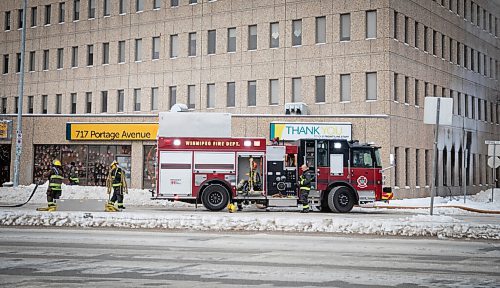 JESSICA LEE / WINNIPEG FREE PRESS

Fire fighters are photographed exiting the New Directions building at 717 Portage Avenue after putting out a fire that occurred there earlier in the day on January 3, 2022.









