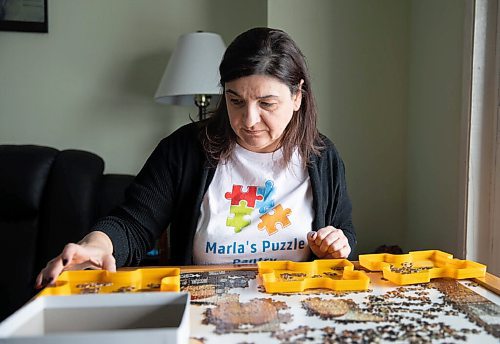 JESSICA LEE / WINNIPEG FREE PRESS

Marla Aronovitch, owner of Marlas Puzzle Pantry, is photographed on January 4, 2022 at her home working on a puzzle. Before COVID-19, she started selling puzzles and her business really took off during the pandemic.

Reporter: Dave









