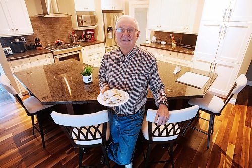 JOHN WOODS / WINNIPEG FREE PRESS
Retired judge Donald Bryk is photographed in his Headingley home, Tuesday, January 4, 2022. Bryk sued Fedex and won for breach of contract when they failed to deliver a package of perogies to his son in Toronto by the contracted next day 3pm delivery.

Re: Pritchard