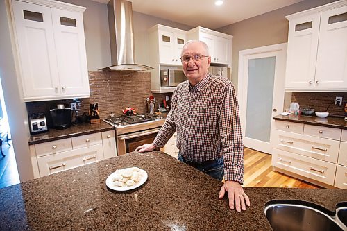 JOHN WOODS / WINNIPEG FREE PRESS
Retired judge Donald Bryk is photographed in his Headingley home, Tuesday, January 4, 2022. Bryk sued Fedex and won for breach of contract when they failed to deliver a package of perogies to his son in Toronto by the contracted next day 3pm delivery.

Re: Pritchard