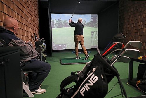 RUTH BONNEVILLE / WINNIPEG FREE PRESS

SPORTS - golf simulators

Photos taken at  Rossmere Golf & Country Club, in one of their Golf Simulator booths (Sim Shack). with  Lori Thompson teeing off and his friend, Lorne Jamison looking on.  

Story on the local virtual golf scene in Winnipeg. Is it seeing a boom because of COVID?

Taylor Allen story 

Jan 10th,  2022
