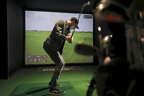 RUTH BONNEVILLE / WINNIPEG FREE PRESS

SPORTS - golf simulators

Photos taken at  Rossmere Golf & Country Club, in one of their Golf Simulator booths (Sim Shack) as reporter Taylor Allen tries it out.  

Story on the local virtual golf scene in Winnipeg. Is it seeing a boom because of COVID?

Taylor Allen story 

Jan 10th,  2022
