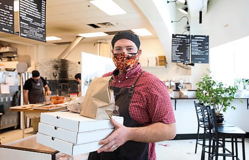 RUTH BONNEVILLE / WINNIPEG FREE PRESS

BIZ - Hildegards Bakery

David Newsom, co-owner of Hildegards Bakery, with boxed food for pick-up.  See Story.

 At one point, all of Hildegards Bakerys online restaurant sales were coming through DoorDash, which dramatically decreases its revenue per sale. Newsom wants people to know the shop benefits more when orders come through Hildegards Bakerys website. 


Jan 11th,  2022
