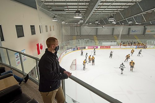 Mike Sudoma / Winnipeg Free Press
Hockey referee and author of How to Referee Hockey, Mitchell Jeffrey, watching a beer league game at the MTS Iceplex Tuesday evening.
January 11, 2022