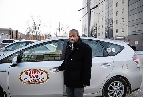 JESSICA LEE / WINNIPEG FREE PRESS

Duffy's Taxi driver Fitsum Ghebrehet, 48, was stabbed on Christmas Eve by an irate passenger. He poses for a photo on January 13, 2022 near the Unicity Taxi Company.

Reporter: Erik








