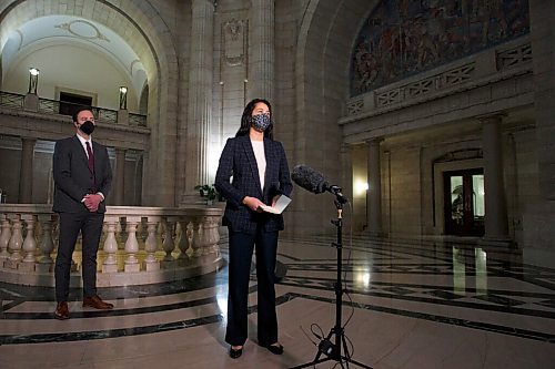 MIKE DEAL / WINNIPEG FREE PRESS
Wab Kinew, Leader of the Manitoba NDP, Malaya Marcelino (speaking), MLA for Notre Dame and Critic for Status of Women, and Adrien Sala (left), MLA for St. James, during a press conference in the Rotunda at the Manitoba Legislative building Friday morning.
See Carol Sanders story
220114 - Friday, January 14, 2022.