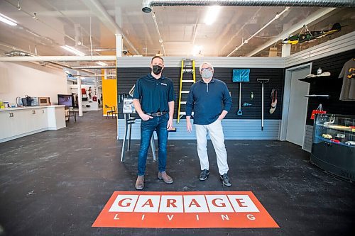 MIKAELA MACKENZIE / WINNIPEG FREE PRESS

Kevin Abraham (left) and Brian Friesen, co-owners of Garage Living, pose for a portrait at the new franchise on Main Street in Winnipeg on Friday, Jan. 14, 2022. For biz story.
Winnipeg Free Press 2022.