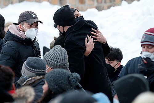 JOHN WOODS / WINNIPEG FREE PRESS
Family and friends comfort eachother as they attend a memorial/celebration of life for musician Vince Fontaine at Oodena Circle at the Forks Sunday, January 16, 2022. 

Re: ?