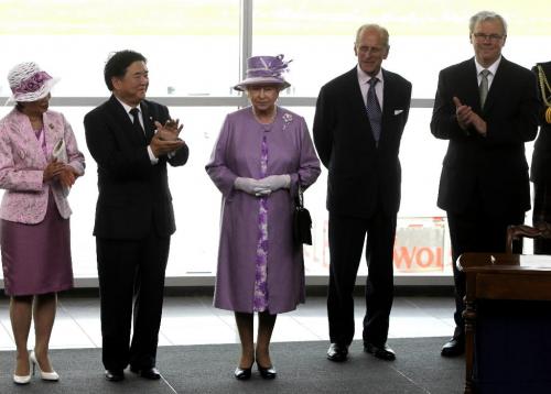 MIKE.DEAL@FREEPRESS.MB.CA 100703 - Saturday, July 03, 2010 -  Her Majesty Queen Elizabeth II arrives at the James Armstrong Richardson International Airport in Winnipeg, MB. Queen Elizabeth II and Prince Philip the Duke of Edinburgh were the first passengers of a flight to be processed at the new airport terminal. On the left is His Honour the Honourable Philip S. Lee the Lieutenant Governor of Manitoba and his wife Her Honour Mrs. Anita Lee. MIKE DEAL / WINNIPEG FREE PRESS