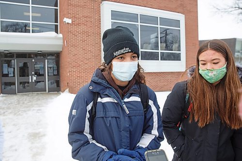 MIKE DEAL / WINNIPEG FREE PRESS
(from l-r) Riley Sloane-Seale, and Iayana Kent grade 9 students from Kelvin High School took part in the walkout along with around 100 other students during the middle of class to raise awareness of lack of student safety. The walkout was organized by students at more than 75 schools.
See Maggie Macintosh story
220117 - Monday, January 17, 2022.