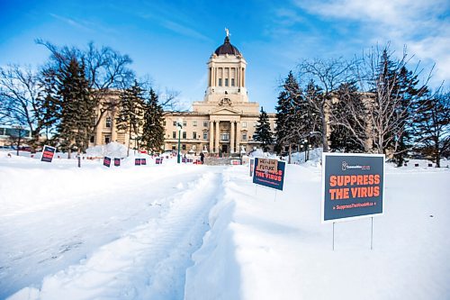 MIKAELA MACKENZIE / WINNIPEG FREE PRESS

A sign garden in support of and in solidarity with the Manitoba Students for COVID Safety Student Walkout on the legislative grounds in Winnipeg on Monday, Jan. 17, 2022. . For --- story.
Winnipeg Free Press 2022.