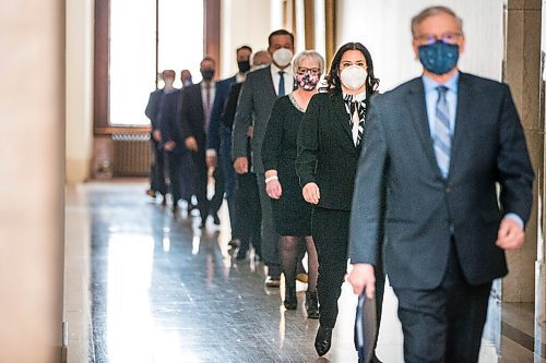 MIKAELA MACKENZIE / WINNIPEG FREE PRESS

Premier Heather Stefanson leads new members of cabinet into the swearing-in ceremony at the Manitoba Legislative Building  in Winnipeg on Tuesday, Jan. 18, 2022. For --- story.
Winnipeg Free Press 2022.