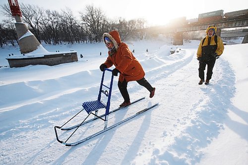 JOHN WOODS / WINNIPEG FREE PRESS
Viola and Dan Prowse, kick sledding enthusiasts, are photographed using their Esla T7 sled on the trails at the Forks Tuesday, January 18, 2022. The couple use their purpose built sled to explore the city.

Re: Wasney