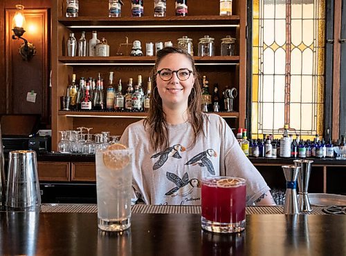 JESSICA LEE / WINNIPEG FREE PRESS

Callan Anderson, a bartender, poses with the drinks she made on January 20, 2022 at Patent 5. On the left is the Young Grasshopper and on the right is the Violet Beauregard.

Reporter: Declan




