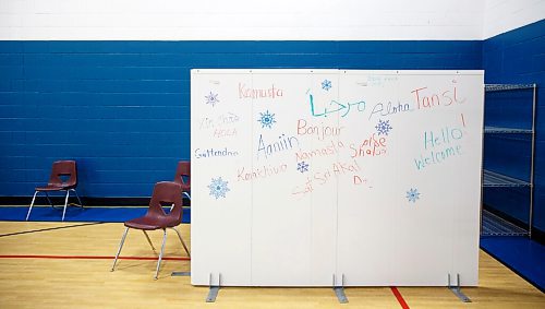 MIKE DEAL / WINNIPEG FREE PRESS
A whiteboard wall at the entrance to the vaccine clinic welcomes people in various languages. Clients are encouraged to add to the wall if their language isn't represented.
Ma Mawi Wi Chi Itata Centre vaccine clinic at 363 McGregor Street, brings in a lot of community support and Indigenous tradition including a morning smudge of the vaccines. The atmosphere of togetherness and one-on-one support has helped many in the area who may be wary of getting the vaccine.
See Melissa Martin story
220121 - Friday, January 21, 2022.