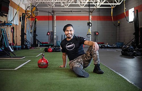 JESSICA LEE / WINNIPEG FREE PRESS

Nolan De Leon, 25, poses for a photo beside a kettle bell on January 20, 2022 at Fukumoto Fitness. In October, De Leon broke the Guinness World Record for heaviest weight lifted by Turkish get-up in one hour. He lifted a total of 5,897.2 kg using a 32 kg kettle bell. Along the way, he raised more than $3,500 for Mood Disorders Association of Manitoba.

Reporter: Aaron





