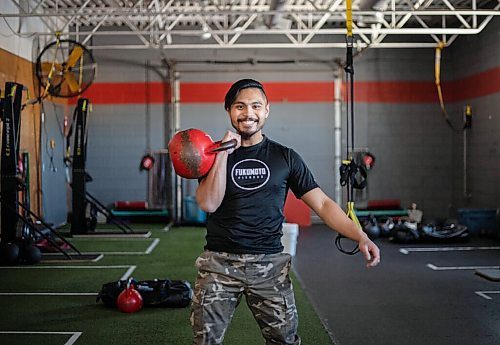 JESSICA LEE / WINNIPEG FREE PRESS

Nolan De Leon, 25, poses for a photo on January 20, 2022 at Fukumoto Fitness. In October, De Leon broke the Guinness World Record for heaviest weight lifted by Turkish get-up in one hour. He lifted a total of 5,897.2 kg using a 32 kg kettle bell. Along the way, he raised more than $3,500 for Mood Disorders Association of Manitoba.

Reporter: Aaron




