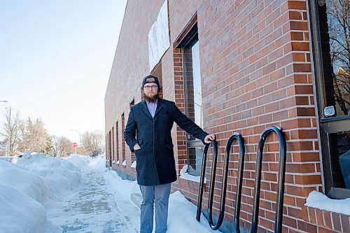 Mike Sudoma / Winnipeg Free Press
Local Entrepreneur and Co founder of Shrugging Doctor Winery, Willows Christopher, shows off the bike rack which was damaged outside of his storefront due to recent snow clearing by the City of Winnipeg
January 24, 2022