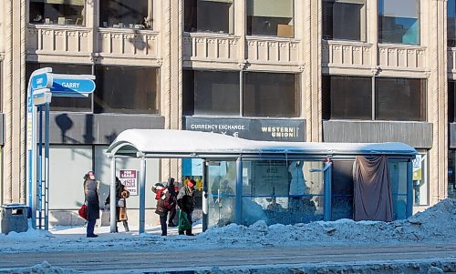 MIKE DEAL / WINNIPEG FREE PRESS
Winnipeg police arrested a 38-year-old man  after a passerby saw him sexually assaulting a woman in her 50s inside this bus shelter at Garry Street and Portage Avenue on Friday evening.
220125 - Tuesday, January 25, 2022.