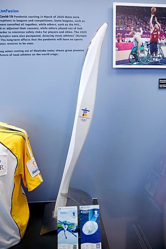 MIKE DEAL / WINNIPEG FREE PRESS
Andrea Reichert, curator at the Manitoba Sports Hall of Fame & Museum, with artifacts from previous winter Olympics.
One of the 2010 Vancouver Olympic Torches.
See Brenda Suderman story
220125 - Tuesday, January 25, 2022.