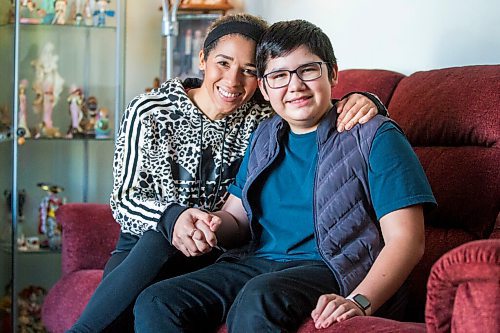 MIKAELA MACKENZIE / WINNIPEG FREE PRESS

Desiree Scott and her 11-year-old brother, DeeJay Sinclair, pose for a portrait in their home in Winnipeg on Thursday, Jan. 27, 2022.  For Mike Sawatzky story.
Winnipeg Free Press 2022.