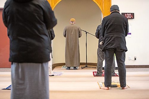 Daniel Crump / Winnipeg Free Press. People take part in the 1pm prayer, lead by Prayer Leader Atef Ibrahim, at the Grand Mosque in Winnipeg. Today marks the fifth anniversary of the Quebec mosque shooting when six people were killed and 19 injured by a gunman who opened fire at the mosque. January 29, 2022.