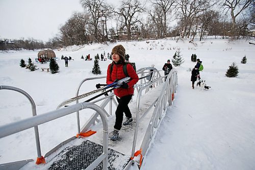 JOHN WOODS / WINNIPEG FREE PRESS
Lindsay Somers, who uses Winnipegs river ice trails to commute to work and to exercise with her friends and running club, is photographed walking home from the Assiniboine River trail at the Hugo Dock  terminus Sunday, January 30, 2022. 

Re: Abas