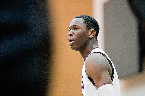 MIKAELA MACKENZIE / WINNIPEG FREE PRESS

St. Pauls Crusader Ramogi Nyagudi (14) plays in a game against the John Taylor Pipers in Winnipeg on Monday, Jan. 31, 2022.  For Mike Sawatzky story.
Winnipeg Free Press 2022.