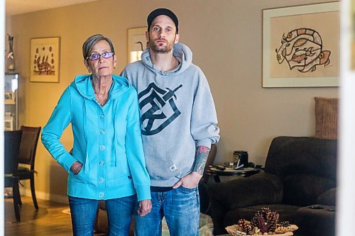 MIKAELA MACKENZIE / WINNIPEG FREE PRESS

Wendy Petrushak and her son, Graeme Mohr, pose for a photo in her condo, which they had to flee because of the Kimberly fire, in Winnipeg on Tuesday, Feb. 1, 2022. For Chris Kitching story.
Winnipeg Free Press 2022.