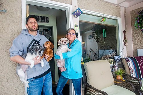 MIKAELA MACKENZIE / WINNIPEG FREE PRESS

Wendy Petrushak and her son, Graeme Mohr, pose for a photo in her condo, which they had to flee because of the Kimberly fire, in Winnipeg on Tuesday, Feb. 1, 2022. For Chris Kitching story.
Winnipeg Free Press 2022.