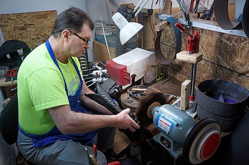 MIKE DEAL / WINNIPEG FREE PRESS
Nikolay polishes the heel of a boot after fixing it.
Genoveva Karapeneva and Nikolay Karapenev in their shoe repair shop Wednesday morning.
moved to Winnipeg from Bulgaria in 2016, where their only daughter (and only grandson) were already living. The couple had been in the shoe-repair biz for most of their working lives already, so after spending close to a year learning how to speak English, they opened a shop in Old St. Vital and, during the height of COVID, got their Canadian citizenship during a Zoom ceremony.
See Dave Sanderson story
220202 - Wednesday, February 02, 2022.