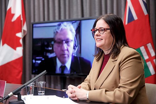 MIKE DEAL / WINNIPEG FREE PRESS
Premier Heather Stefanson listens to virtual participant, Federal Northern Affairs Minister Dan Vandal, during the press conference.
Premier Heather Stefanson and Manitoba Education and Early Childhood Learning Minister Wayne Ewasko are joined Thursday morning by virtual participants, Prime Minister Justin Trudeau, Federal Families, Children and Social Development Minister Karina Gould and Federal Northern Affairs Minister Dan Vandal during an announcement about early learning child-care in Manitoba.
220203 - Thursday, February 03, 2022.