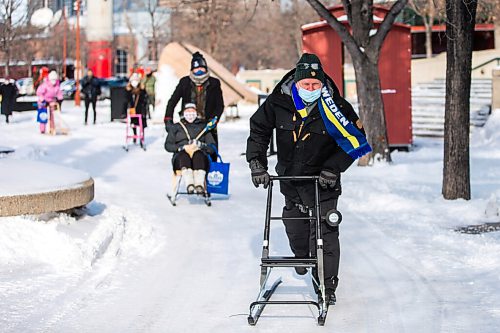 MIKAELA MACKENZIE / WINNIPEG FREE PRESS

Urban Ahlin, the Swedish Ambassador to Canada, takes the lead on a kicksledding jaunt around The Forks in Winnipeg on Thursday, Feb. 3, 2022. For Eva Wasney story.
Winnipeg Free Press 2022.