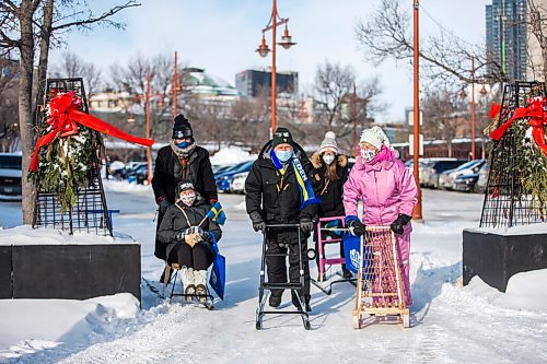 MIKAELA MACKENZIE / WINNIPEG FREE PRESS

Anders Swanson of Trails Winnipeg (left), Marilyn Ekelund, Swedish Association board member, Urban Ahlin, the Swedish Ambassador to Canada, Diana King, Honorary Consul for Norway and Sweden, and Sonja Lundstrom, Swedish Cultural Association of Manitoba president, go on a kicksledding jaunt around The Forks in Winnipeg on Thursday, Feb. 3, 2022. For Eva Wasney story.
Winnipeg Free Press 2022.