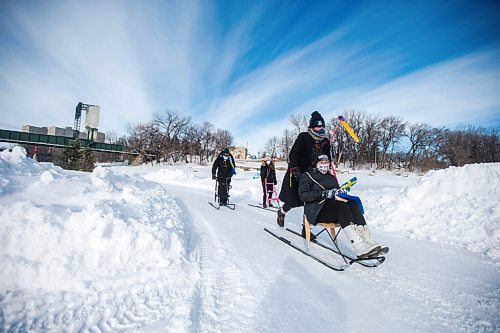 MIKAELA MACKENZIE / WINNIPEG FREE PRESS
Urban Ahlin, the Swedish Ambassador to Canada (left), Diana King, Honorary Consul for Norway and Sweden, Anders Swanson of Trails Winnipeg, and Marilyn Ekelund, Swedish Association board member, go on a kicksledding jaunt around The Forks in Winnipeg on Thursday, Feb. 3, 2022. For Eva Wasney story.
Winnipeg Free Press 2022.
