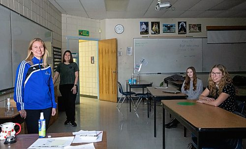 JESSICA LEE / WINNIPEG FREE PRESS

College Jeanne Sauve teachers (from left) Victoria Gudmundson and Véronique Reynolds; and students Isabel OBrien (second from right) and Chloe Crockford are photographed in a classroom on February 3, 2022.

Reporter: Maggie




