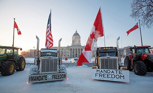 MIKE DEAL / WINNIPEG FREE PRESS
Protesters block the entrance to the Manitoba Legislative building on Broadway Avenue and have parked their trucks along Memorial early Friday morning.
220204 - Friday, February 04, 2022.