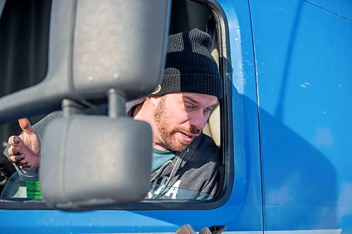 MIKAELA MACKENZIE / WINNIPEG FREE PRESS

Trucker Christopher Siemens participates in a rally against vaccine mandates outside of the Manitoba Legislative Building in Winnipeg on Friday, Feb. 4, 2022. For Carol/Danielle story.
Winnipeg Free Press 2022.