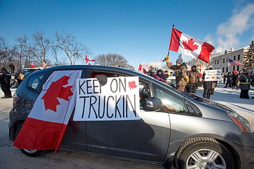 MIKE DEAL / WINNIPEG FREE PRESS
Protesters block the entrance to the Manitoba Legislative building on Broadway Avenue and have parked their trucks along Memorial early Friday morning.
220204 - Friday, February 04, 2022.