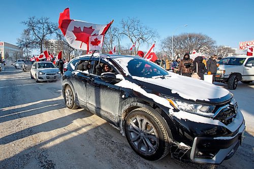 MIKE DEAL / WINNIPEG FREE PRESS
Protesters block the entrance to the Manitoba Legislative building on Broadway Avenue and have parked their trucks along Memorial early Friday morning.
220204 - Friday, February 04, 2022.