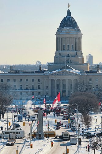 MIKE DEAL / WINNIPEG FREE PRESS
Protesters block the entrance to the Manitoba Legislative building on Broadway Avenue and have parked their trucks along Memorial all day Friday.
220204 - Friday, February 04, 2022.