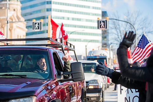 MIKAELA MACKENZIE / WINNIPEG FREE PRESS

Folks rally against vaccine mandates and in support of truckers outside of the Manitoba Legislative Building in Winnipeg on Friday, Feb. 4, 2022. For Carol/Danielle story.
Winnipeg Free Press 2022.