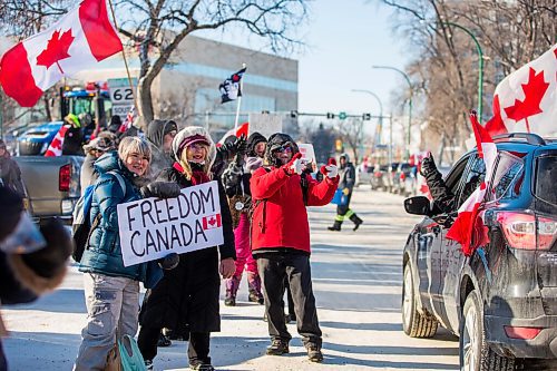 MIKAELA MACKENZIE / WINNIPEG FREE PRESS

Folks rally against vaccine mandates and in support of truckers outside of the Manitoba Legislative Building in Winnipeg on Friday, Feb. 4, 2022. For Carol/Danielle story.
Winnipeg Free Press 2022.