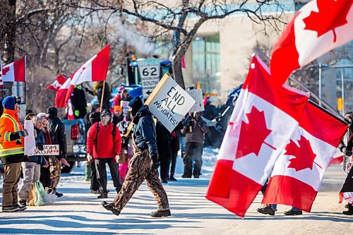 MIKAELA MACKENZIE / WINNIPEG FREE PRESS

Folks rally against vaccine mandates and in support of truckers outside of the Manitoba Legislative Building in Winnipeg on Friday, Feb. 4, 2022. For Carol/Danielle story.
Winnipeg Free Press 2022.