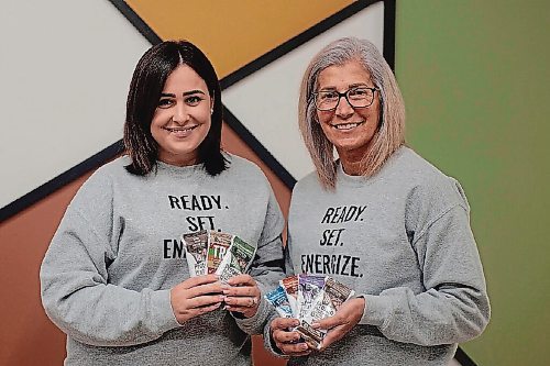 Canstar Community News Michelle Gospic (right) and her daughter Danica Marincil show off their line of protein bars at their soon-to-open store at 624 Leila Avenue.