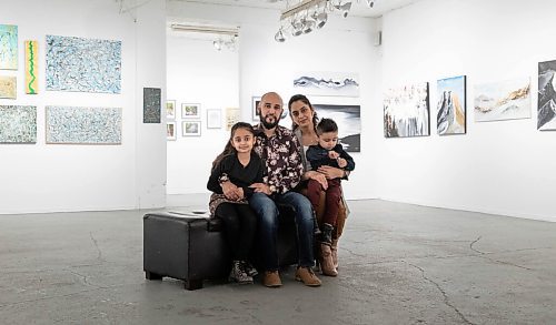 JESSICA LEE / WINNIPEG FREE PRESS

From left family members: Nehal Safi, 7, Tameem Safi,Shabana Dastageerzada, Adham Safi, 2; are photographed at Cre8ery Gallery on February 8, 2022, attending artist Tameem Safis show Through and Through on February 8, 2022.

Reporter: Ben