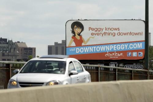 MIKE.DEAL@FREEPRESS.MB.CA 100714 - Wednesday, July 14, 2010 -  Downtown Peggy billboard by the Downtown Biz. MIKE DEAL / WINNIPEG FREE PRESS