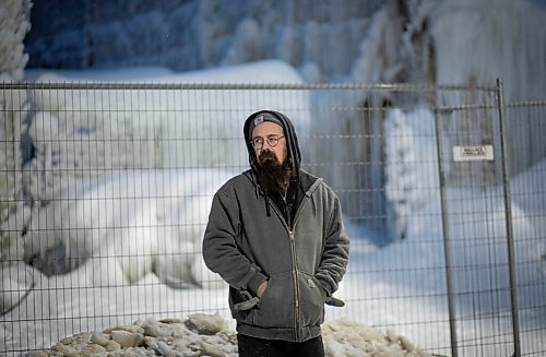 JESSICA LEE / WINNIPEG FREE PRESS

Chris Sawatzky, a guitarist who rented a practice space in the basement of the Kirkwood block, poses for a photo on February 9, 2022. The building is covered with ice from the water the firefighters used to put out the fire on February 2, 2022.

Reporter: Ben






